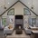 a club house with a fireplace and tv