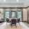 a large room with a large dining table and chairs