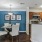 a kitchen with a dining table and chairs