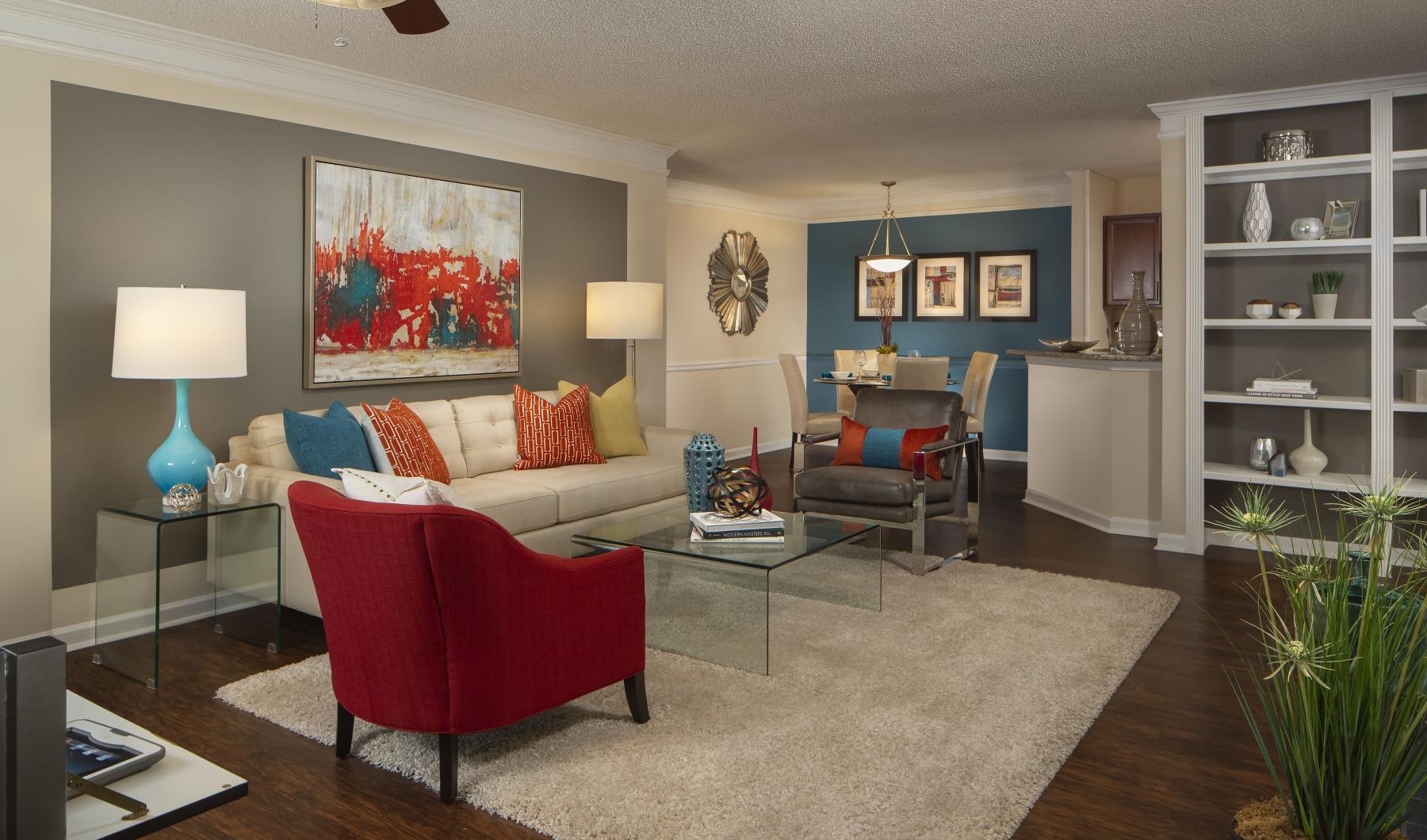 a living room with a couch and a table