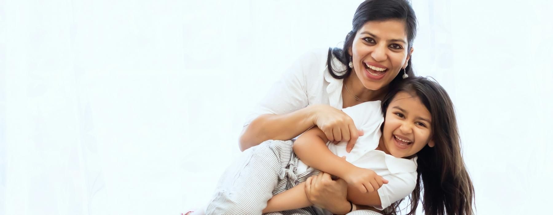 a person holding a child