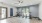a room with stationary bikes and wood floors