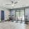 a room with stationary bikes and wood floors
