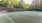 a soccer pitch with a fence around it